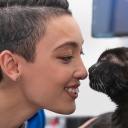 A veterinary technician interacts with a cat client. Photo courtesy of Banfield Pet Hospital®